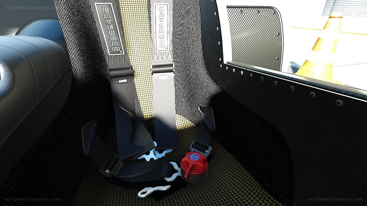 Race car interior with harness