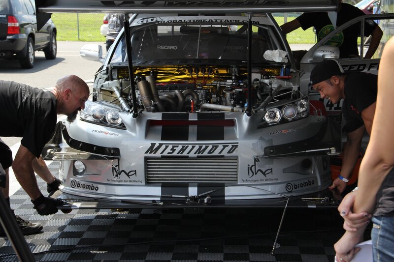 Race car maintenance at pit stop