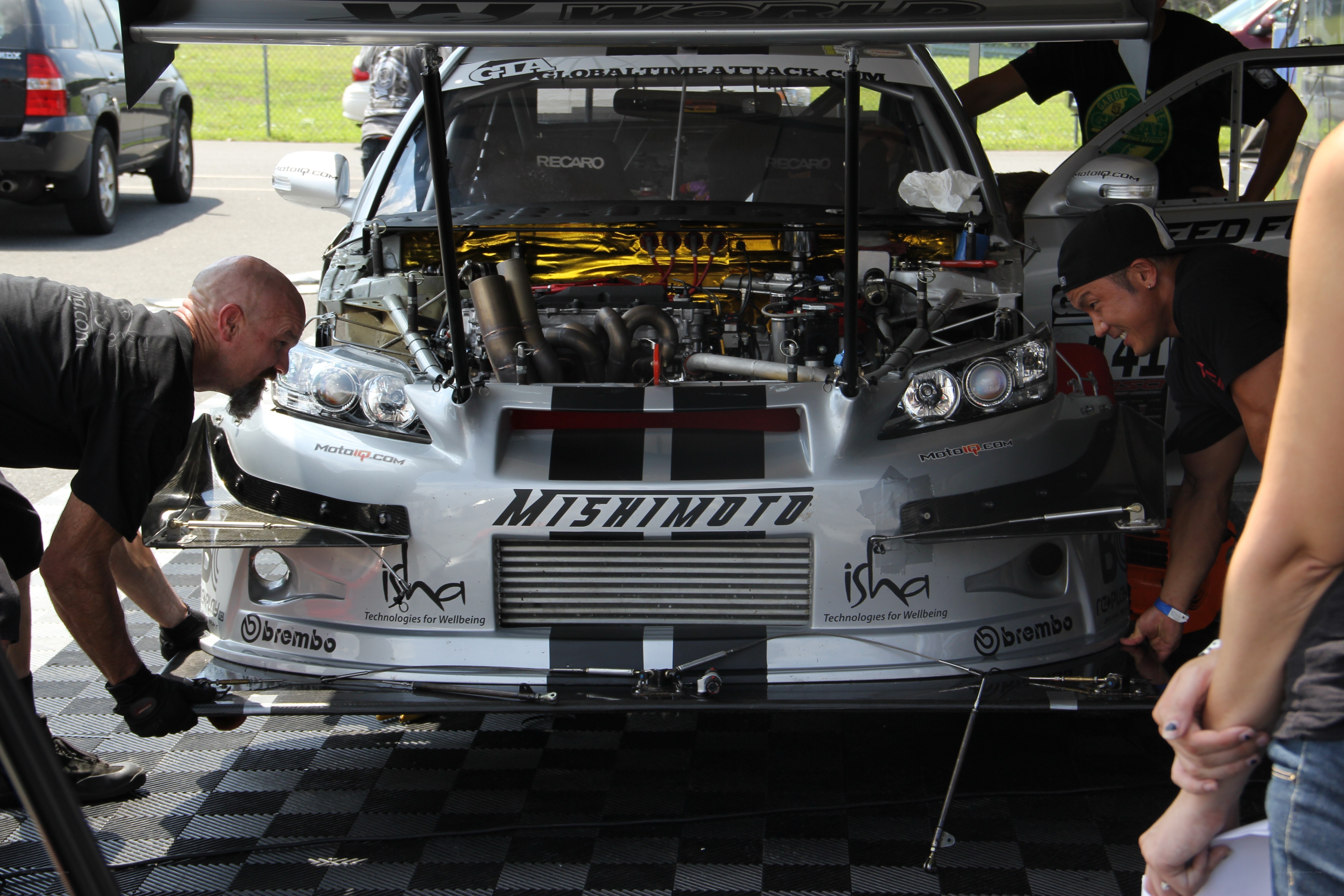 Race car maintenance at pit stop