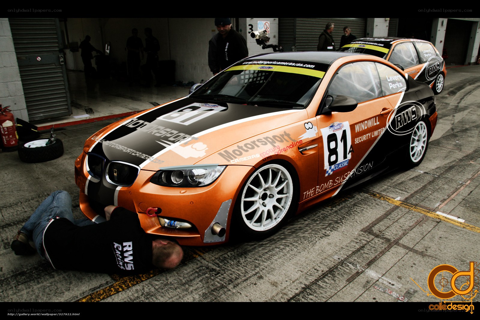 Race car maintenance in garage