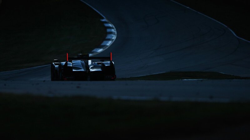 race car on a dark track