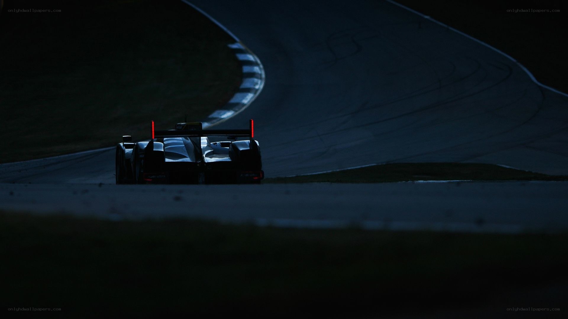 race car on a dark track
