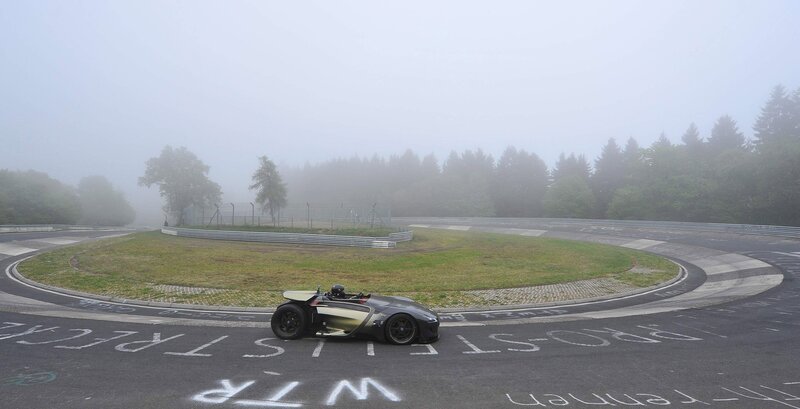 Race car on a foggy track