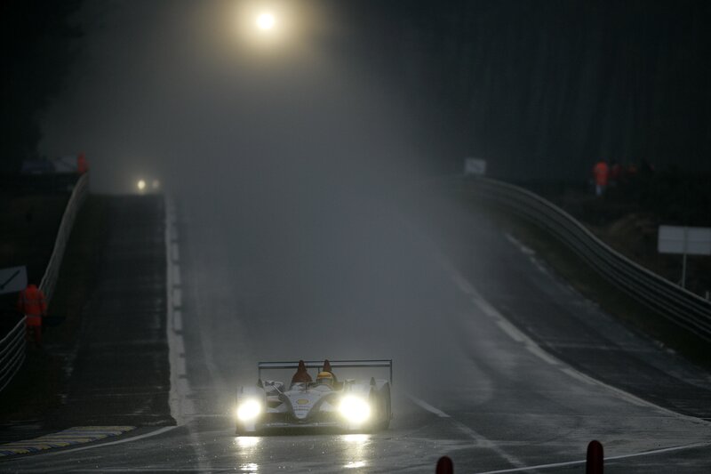 Race car on a foggy track