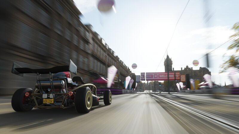 Race Car on City Street — Gray