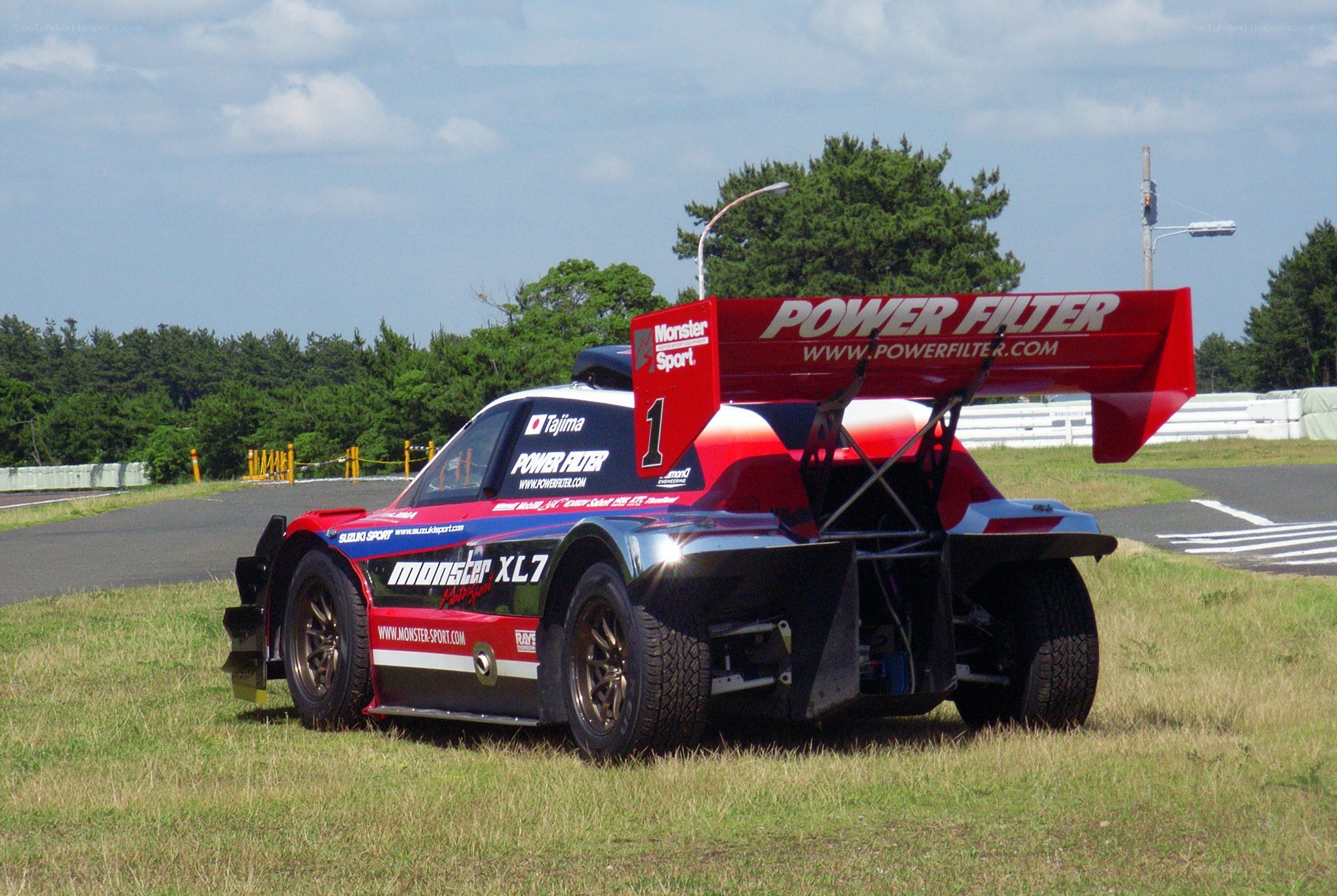 Race car on grassy track