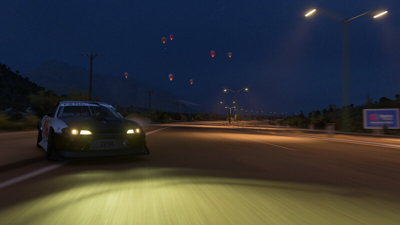 Race Car on Road — Black, Nighttime