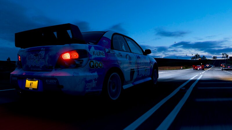 Race Car on Road — Blue
