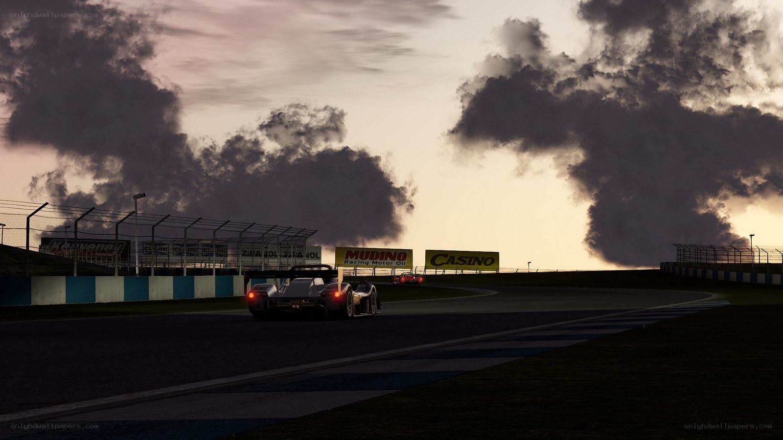 Race car on track at dusk