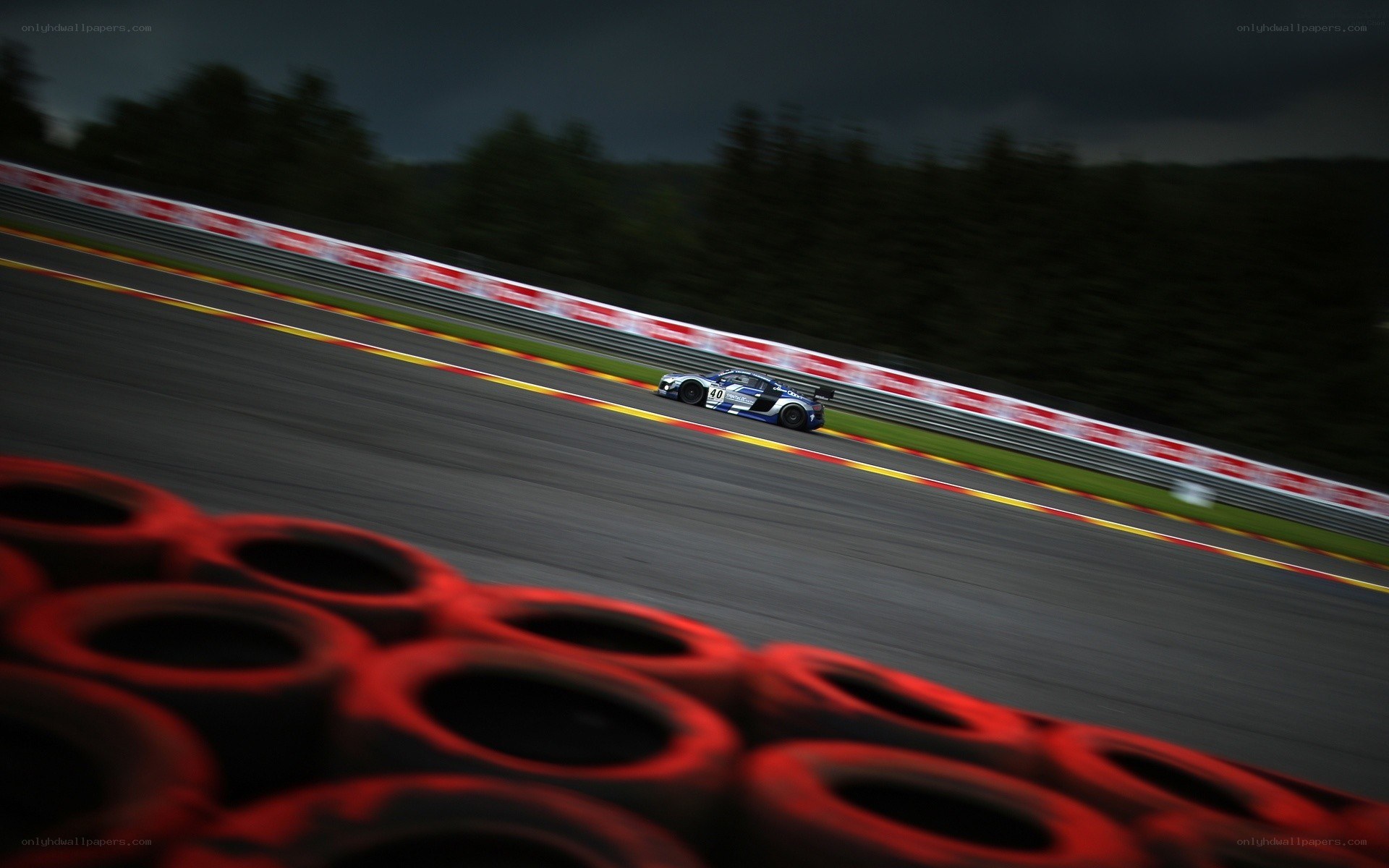 Race car on track at night