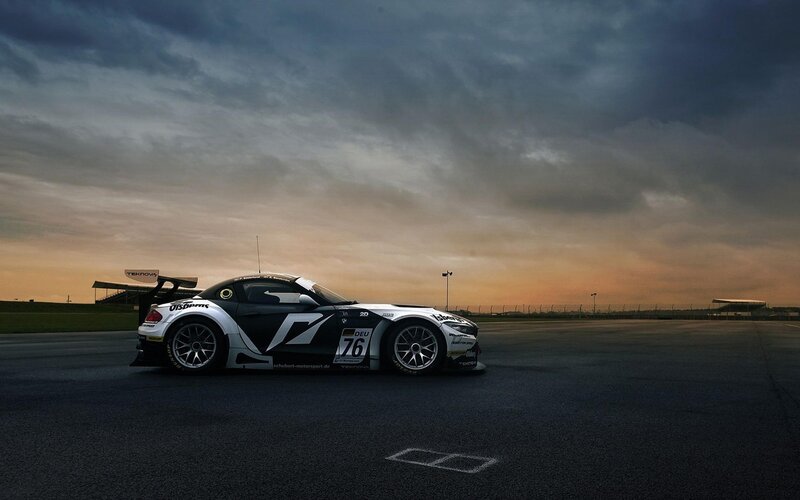 Race Car on Track — Black, Dramatic, Sunset, Photograph, Sky