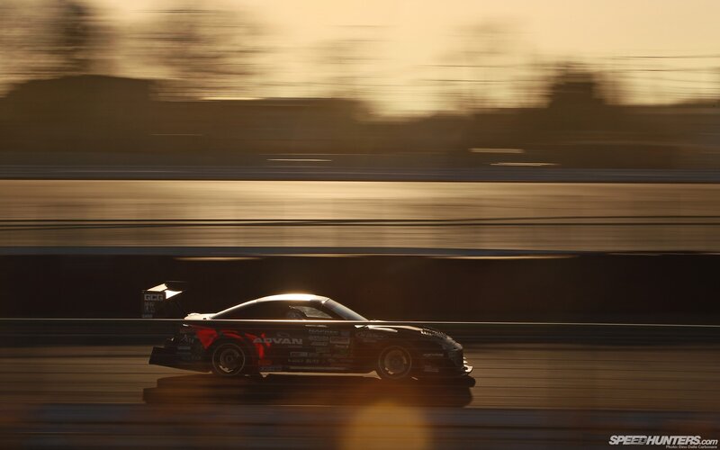 Race Car on Track — Black, Dramatic, Sunset, Photograph, Sunlight