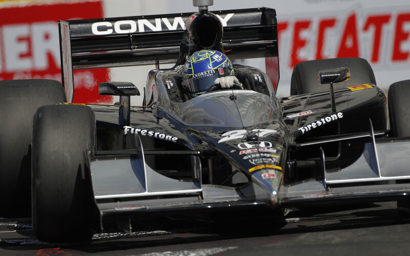 Race Car on Track — Black, Dynamic, Afternoon