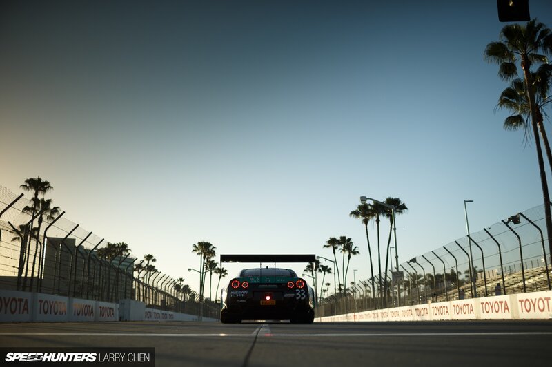 Race Car on Track — Blue, Dramatic, Sunset