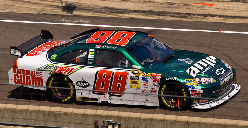 Race Car on Track — Green, Dynamic, Afternoon, Photograph, Racetrack