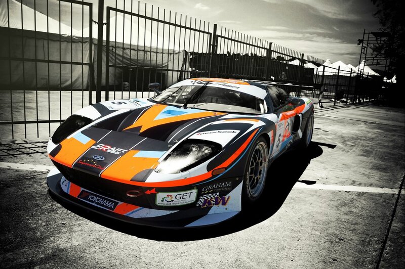 Race Car on Track — Orange, Dramatic, Afternoon, Photograph