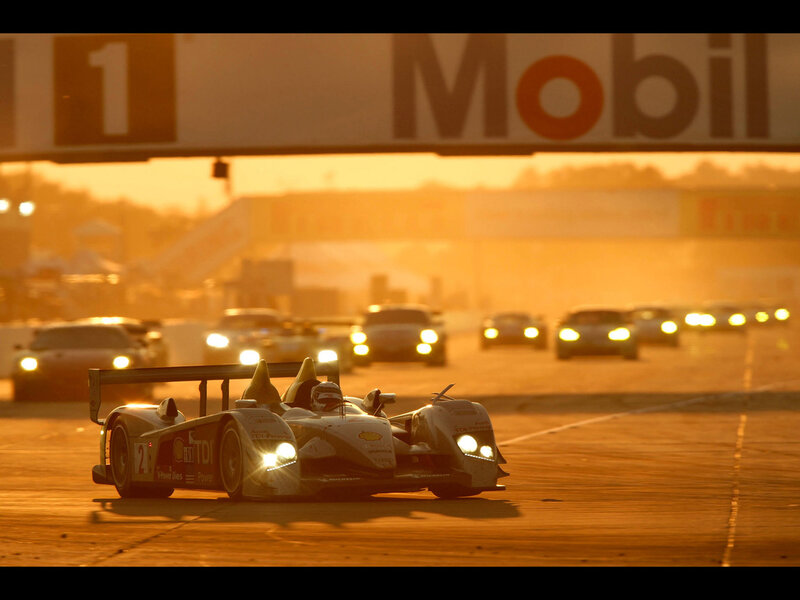 Race Car on Track — Orange, Dramatic, Sunrise