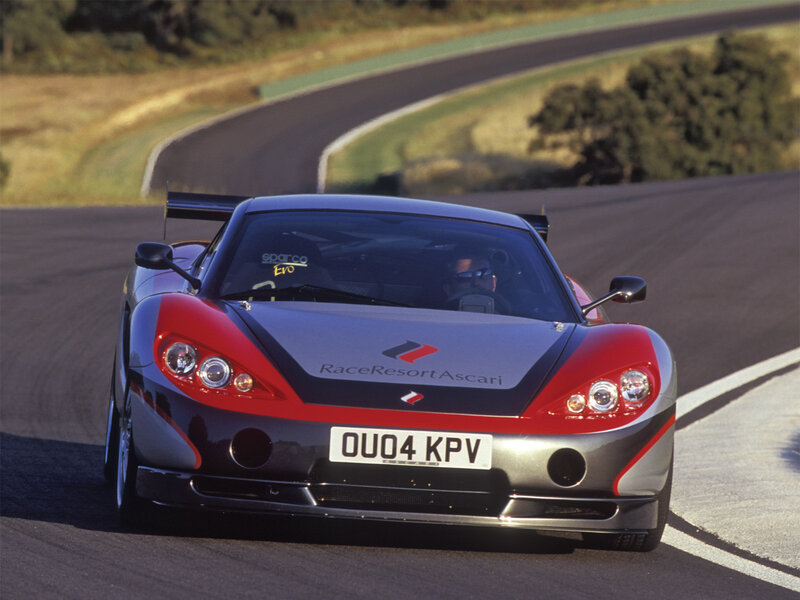 Race Car on Track — Red, Dynamic, Afternoon, Photograph, Driver, Trees