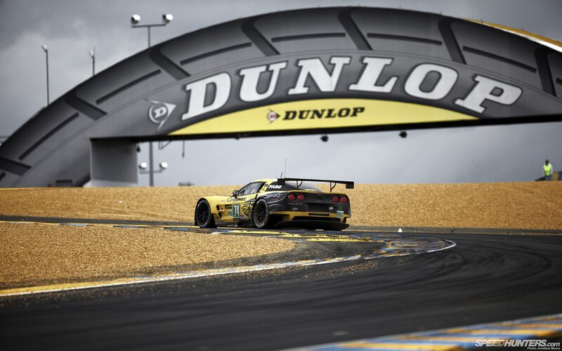 race car on track under Dunlop sign