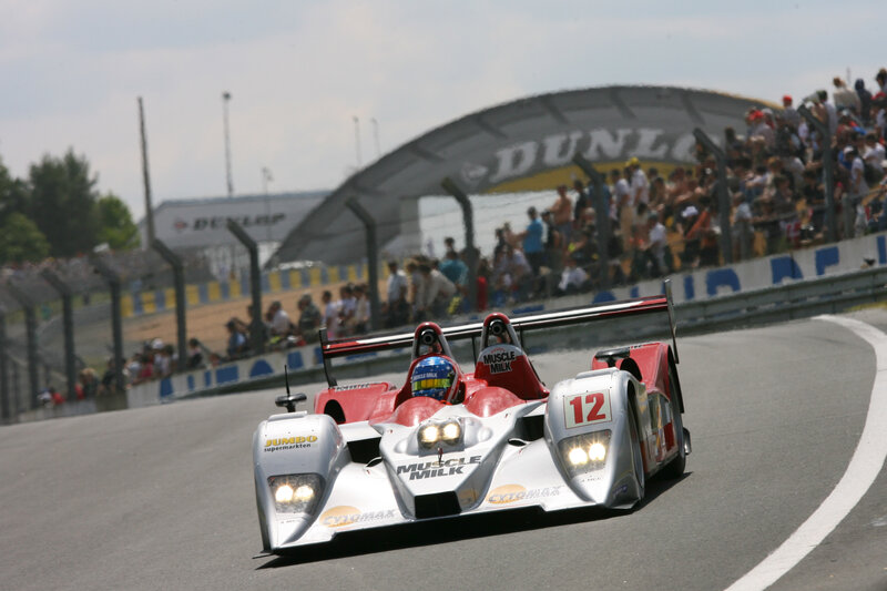 Race Car on Track — White, Dynamic, Afternoon, Photograph, Crowd
