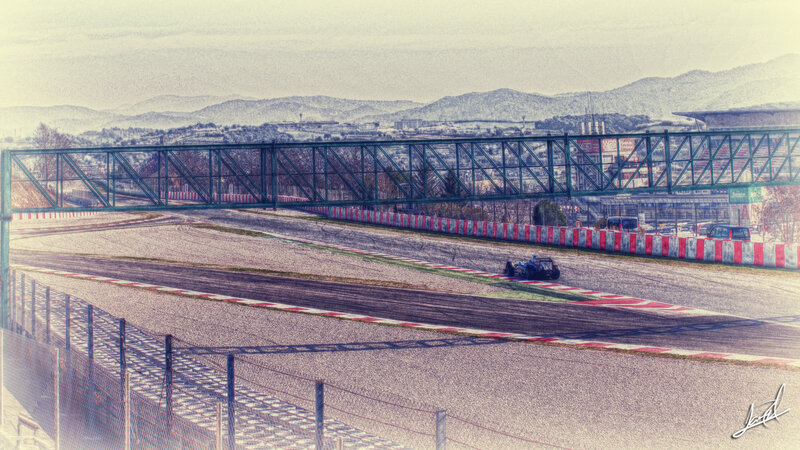 Race car on track with bridge