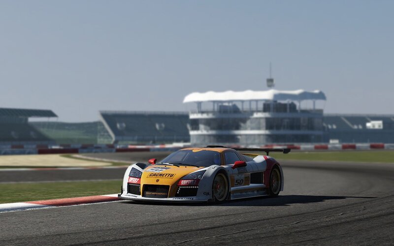 Race Car on Track — Yellow, Dynamic, Afternoon