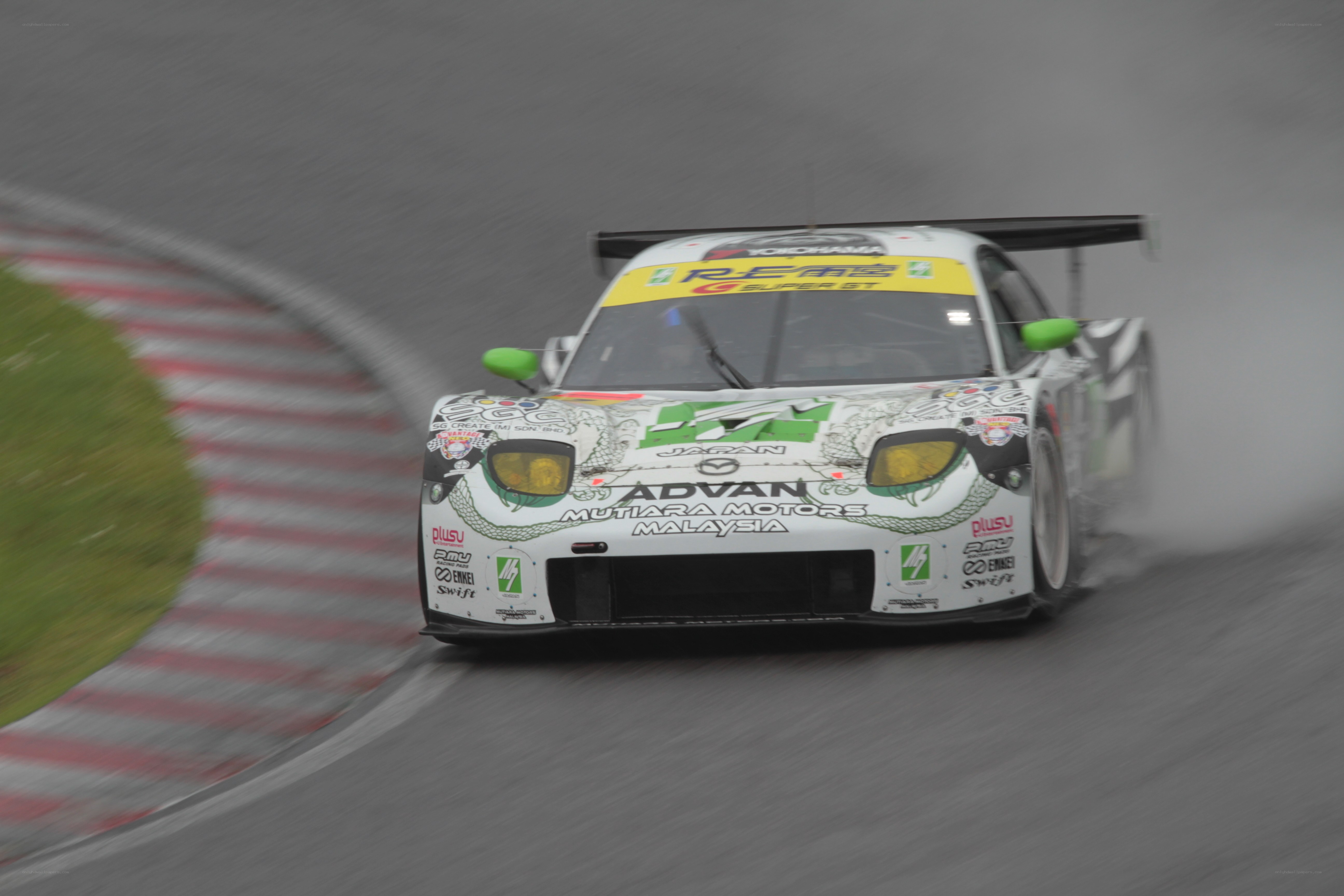 race car on wet track
