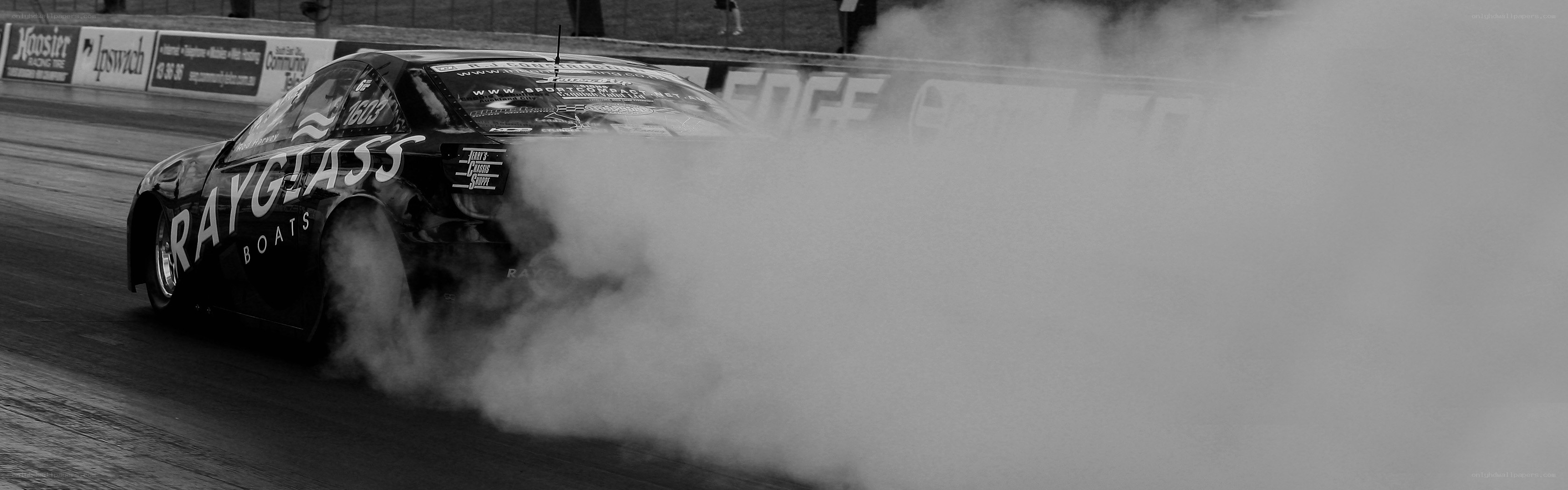 race car performing burnout
