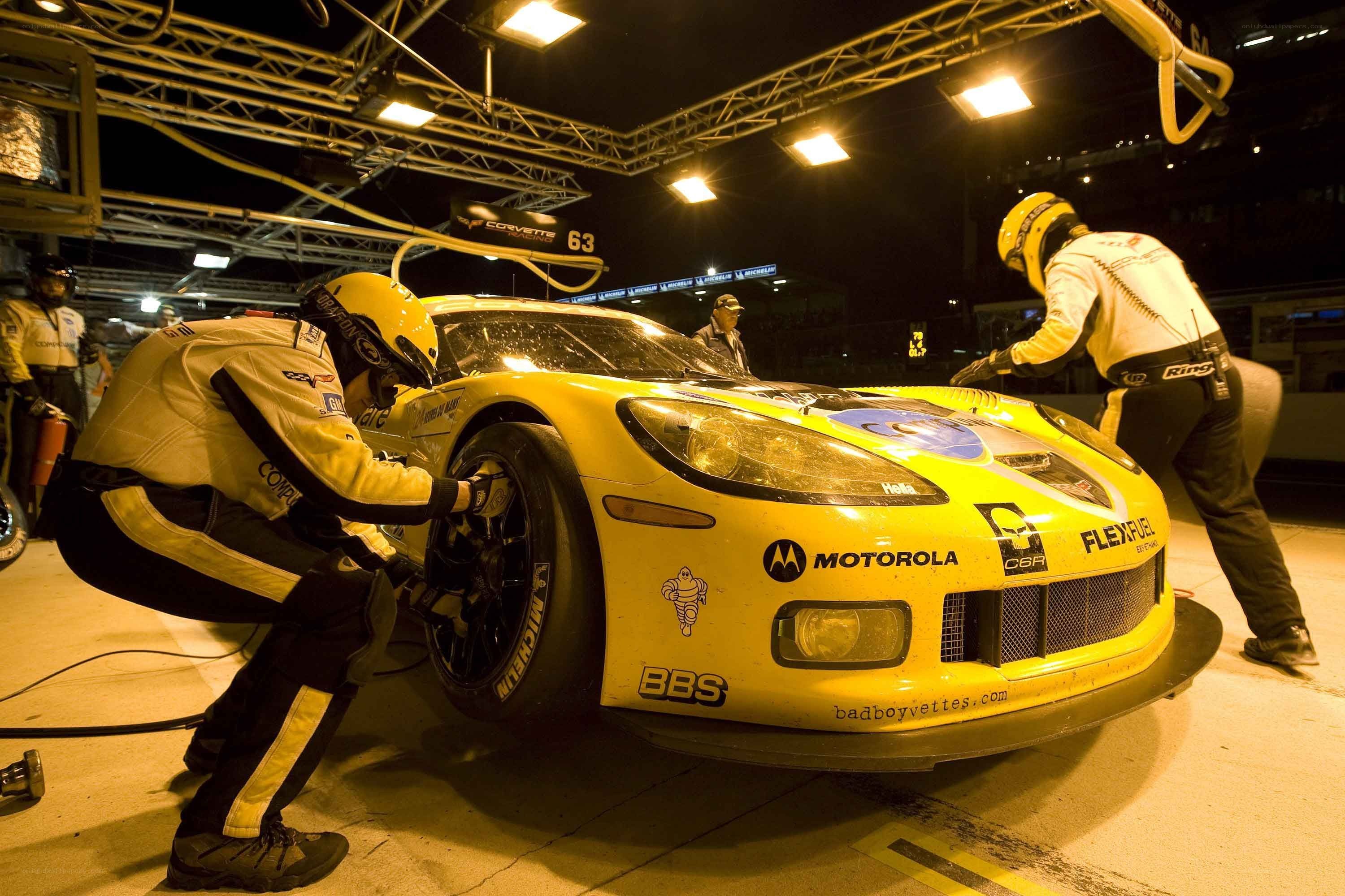Race car pit stop at night