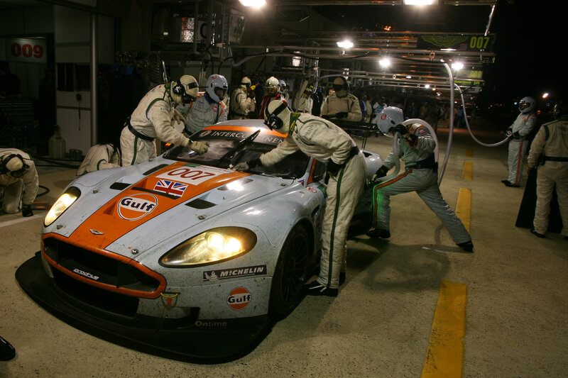 Race car pit stop at night