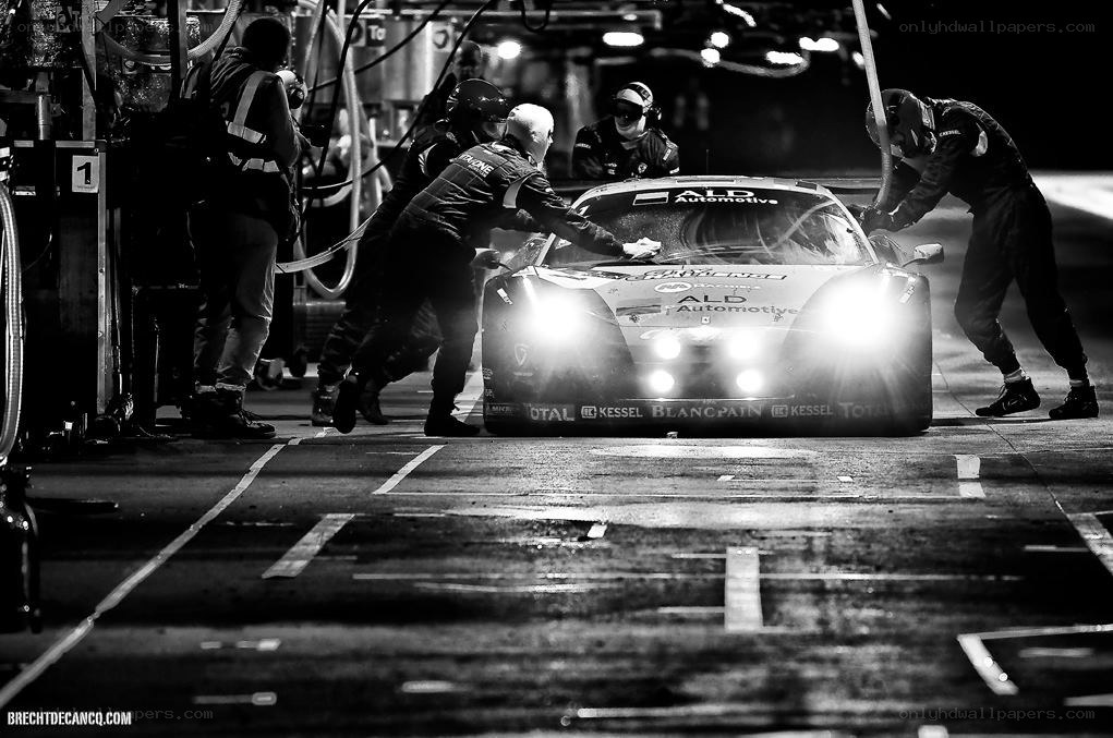 Race car pit stop at night