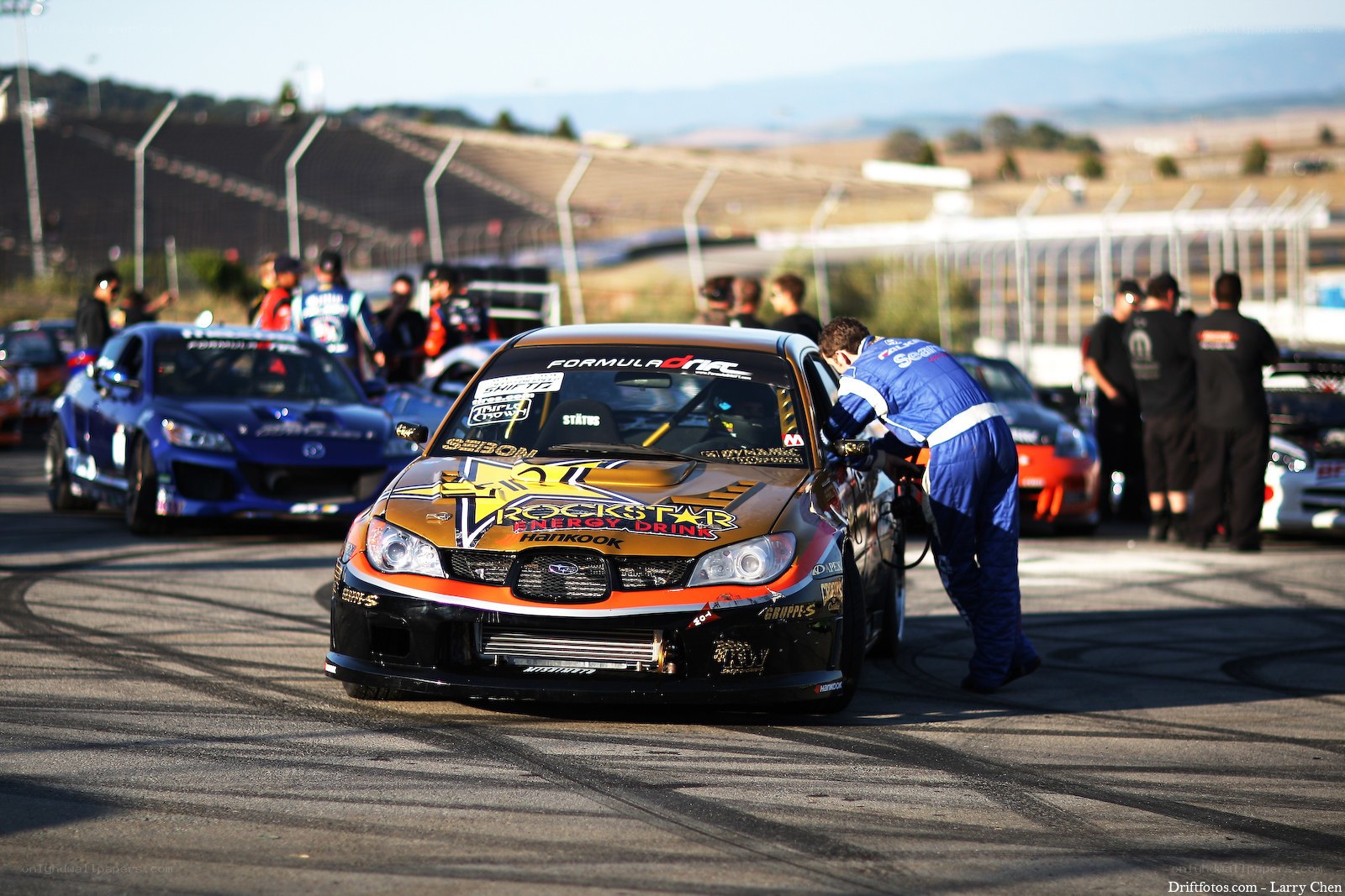 Race car pit stop at track