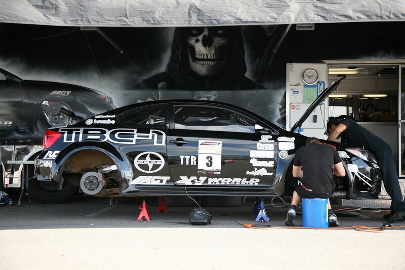 Race car pit stop with skull mural