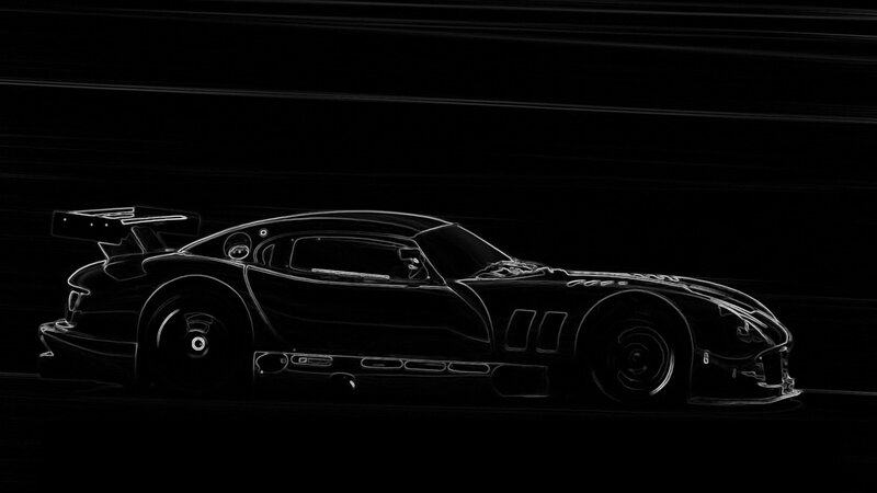 race car silhouette at night