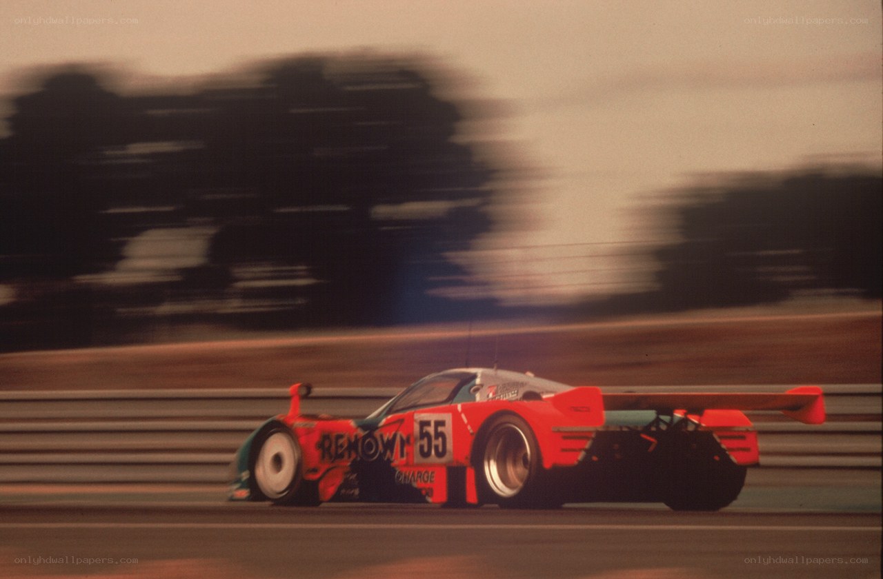 Race car speeding on track