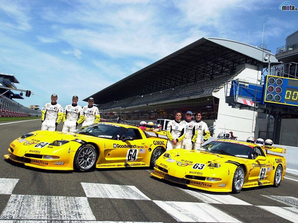 Race car team at the track