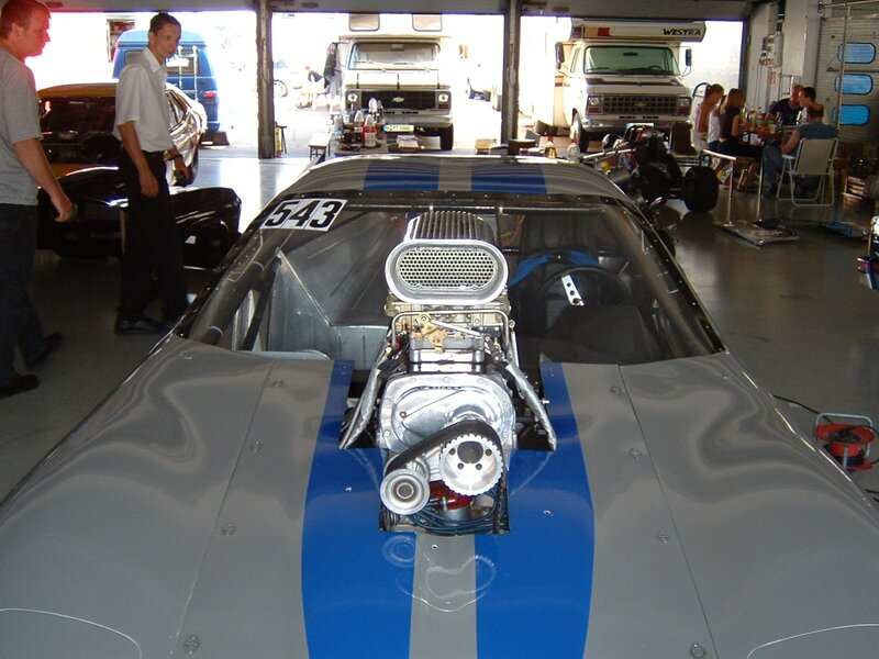 Race car with exposed engine