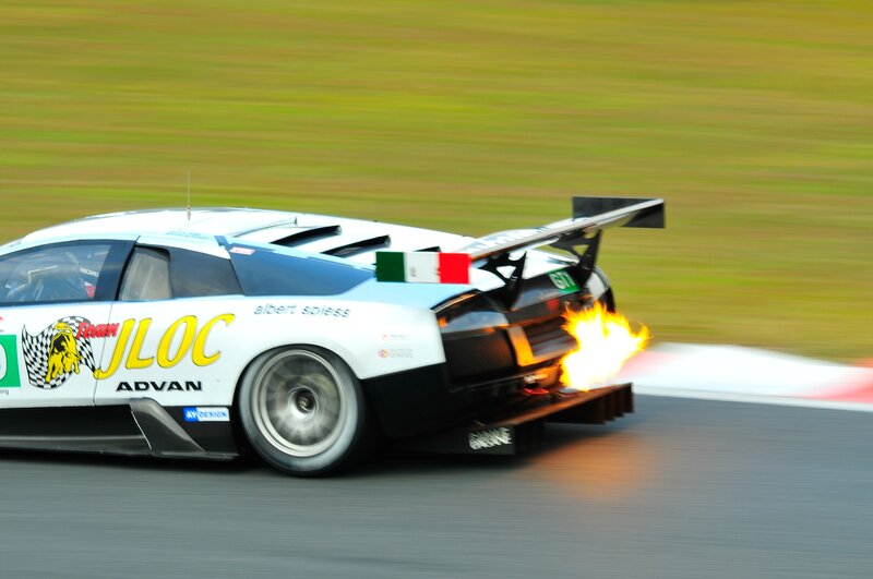 Race car with flames from exhaust