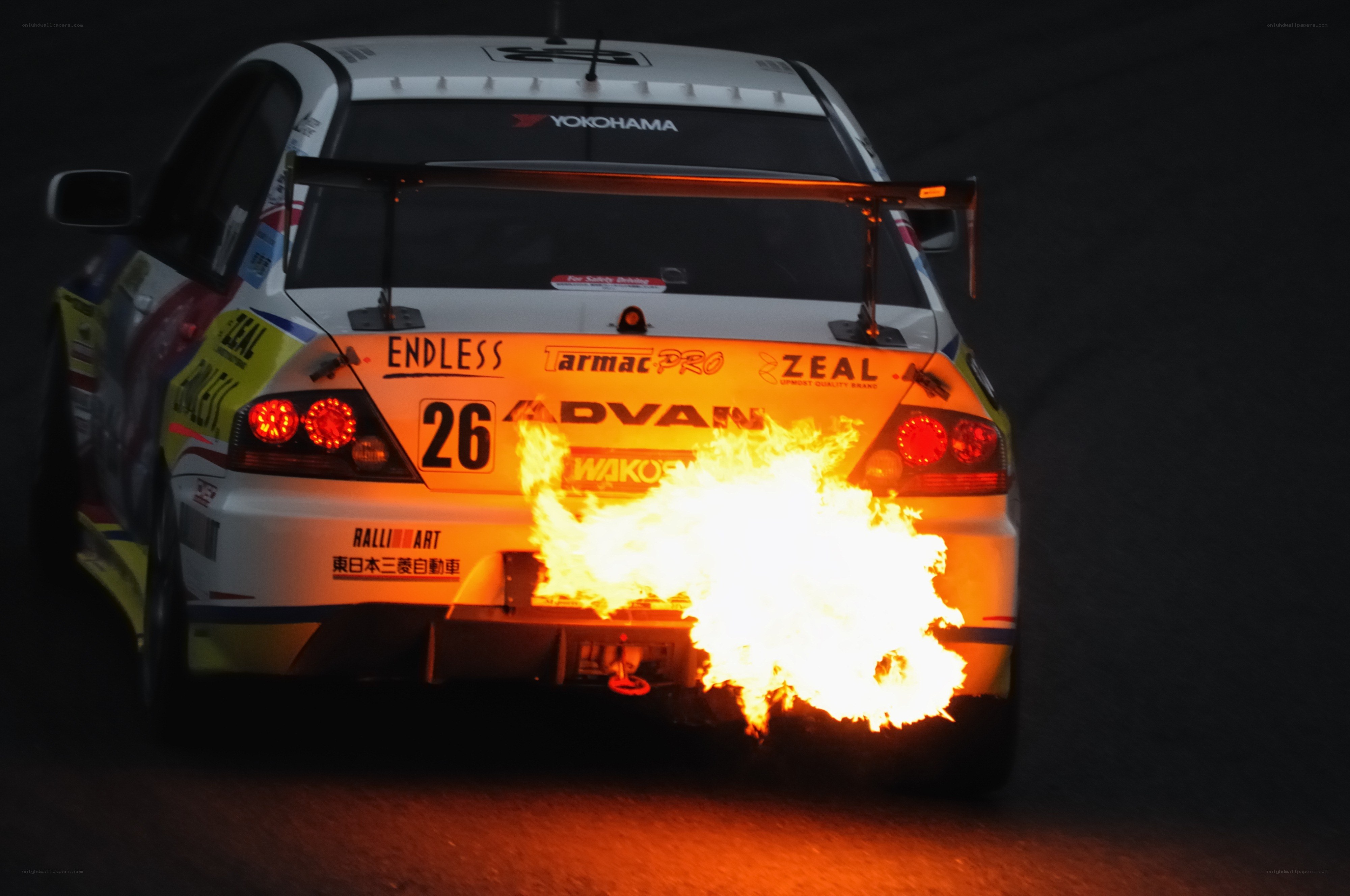 Race car with flames from exhaust