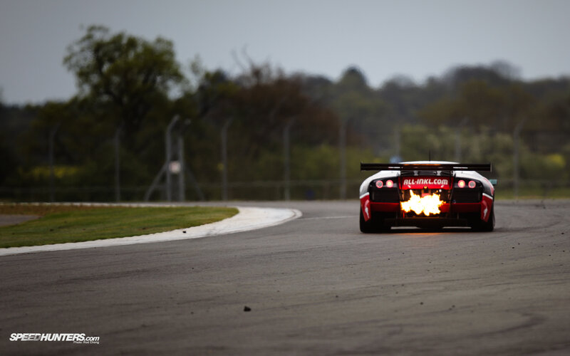 Race car with flames on track