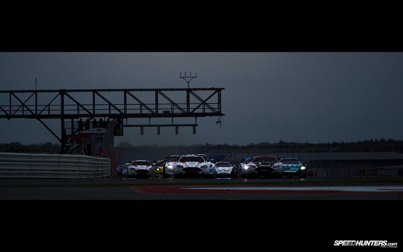 Race cars at dusk