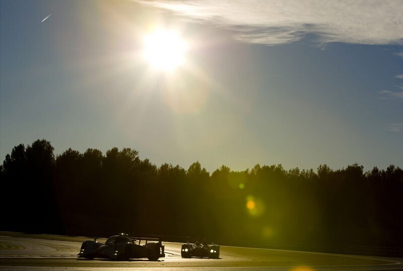 Race cars at sunset