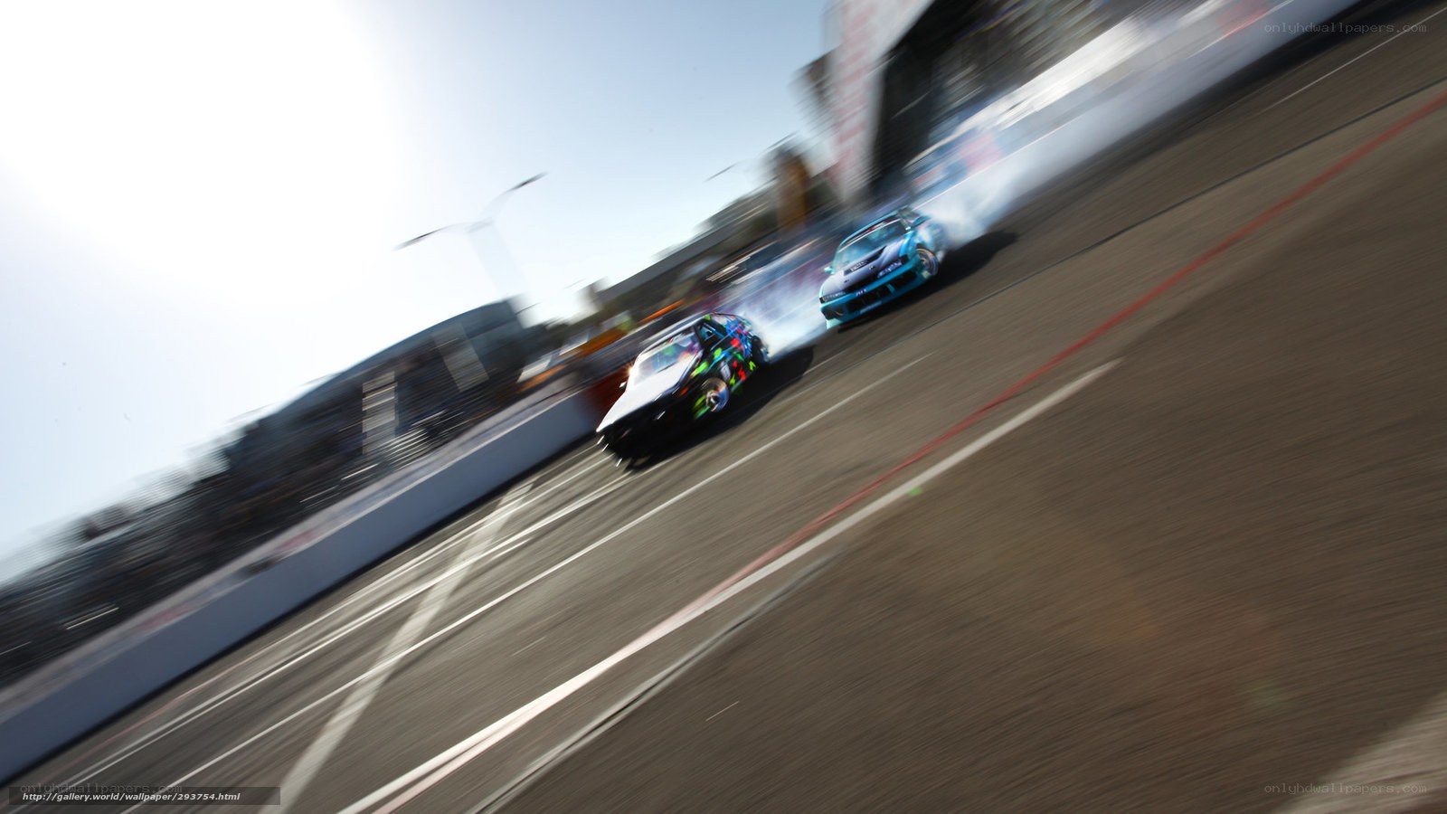 Race cars drifting on track