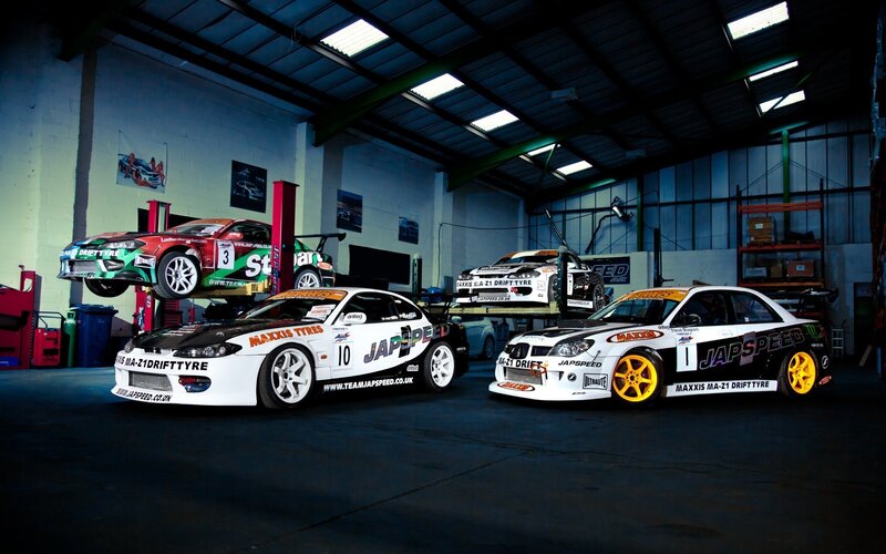 Race cars in a garage