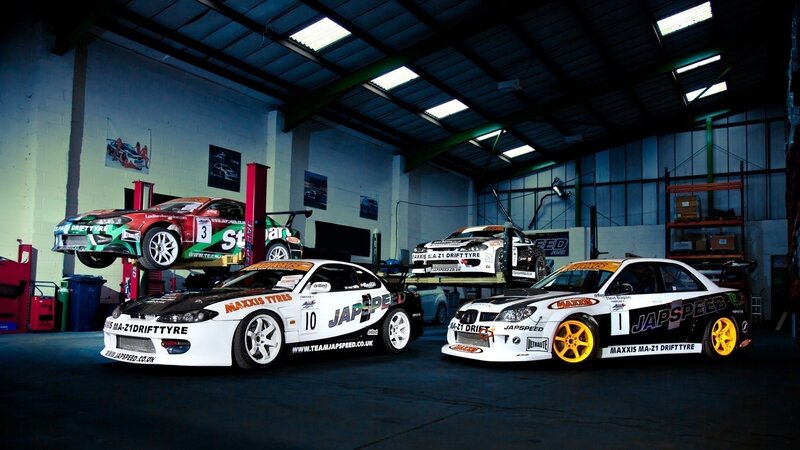 Race cars in a garage