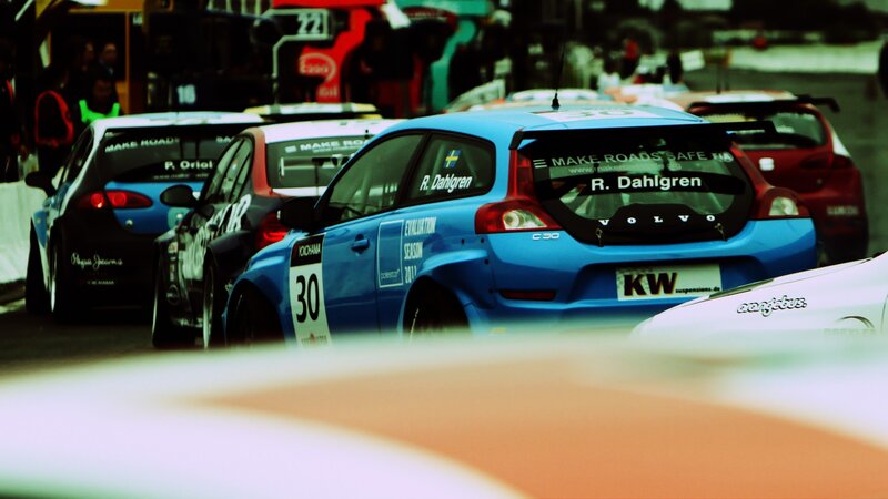 Race cars in pit lane