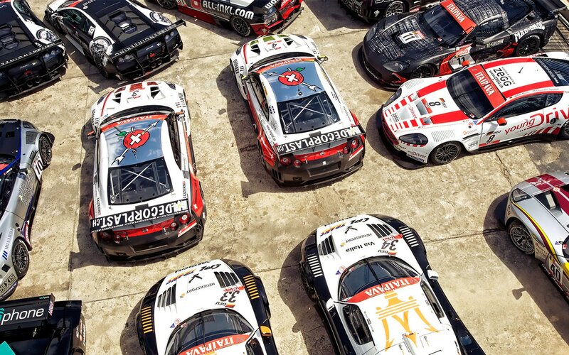 Race cars in pit lane