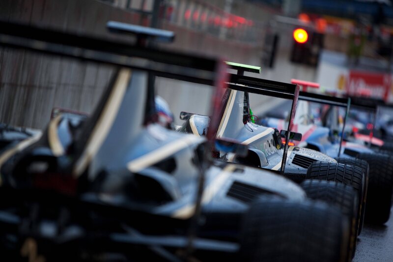 Race cars in pit lane