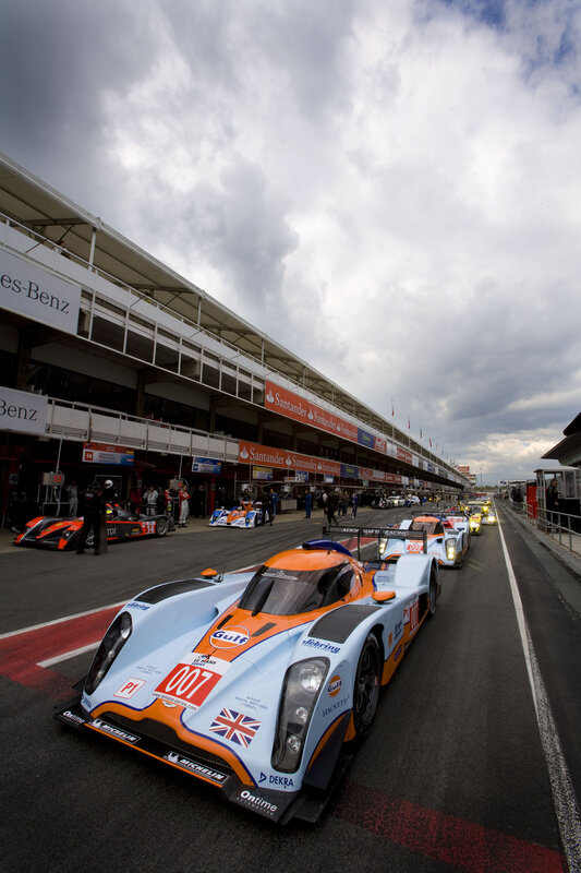 Race cars in pit lane
