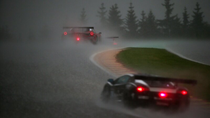 Race cars in rain